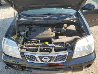 2006 Nissan X-Trail XE z VIN JN8BT08V86W215099, wystawiony jako Copart lot #64736564 z przebiegiem 282 753 mil mil oraz Szkody całkowita. Historia ofert i sprzedaży dostępna na DreamBid. Obrazek 12.