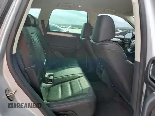 2016 Volkswagen Touareg Sport z VIN WVGEF9BP8GD010468, wystawiony jako Copart lot #53109665 z przebiegiem 55 296 mil mil oraz Szkoda całkowita • Salvage title. Historia ofert i sprzedaży dostępna na DreamBid. Obrazek 11.