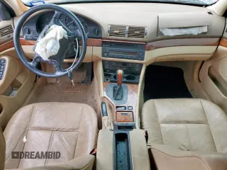 2001 BMW 5 Series 530i z VIN WBADT63451CF13044, wystawiony jako Copart lot #59404495 z przebiegiem Nie podano mil oraz Szkoda całkowita • Salvage title. Historia ofert i sprzedaży dostępna na DreamBid. Obrazek 8.