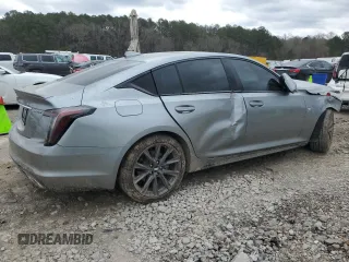 2024 Cadillac CT5 Sport z VIN 1G6DP5RK1R0100462, wystawiony jako Copart lot #47562155 z przebiegiem 12 213 mil mil oraz Szkody całkowita. Historia ofert i sprzedaży dostępna na DreamBid. Obrazek 3.