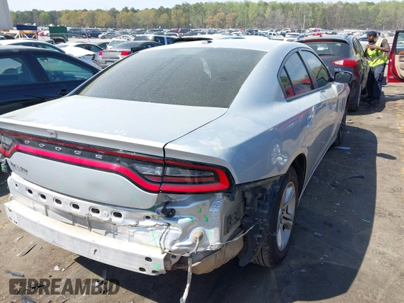 2019 Dodge Charger SXT with VIN 2C3CDXBG0KH572645, listed as a IAAI auction lot 41911868 with 119,024 mi miles. Bid and sale history available at carsss.com. Image 4.