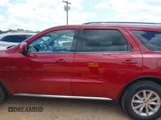 2014 Dodge Durango SXT with VIN 1C4RDHAG8EC476685, listed as a IAAI auction lot 42221303 with 113,829 mi miles and . Bid and sale history available at DreamBid. Image 14.