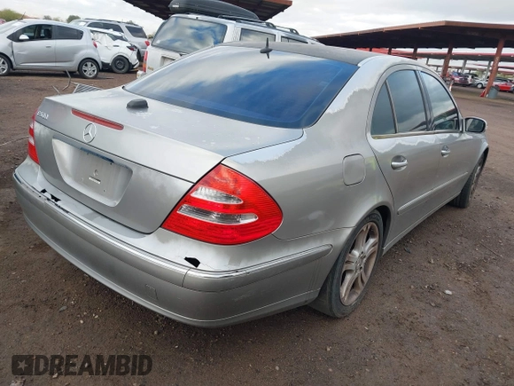 2004 Mercedes-Benz E-Class 5.0L with VIN WDBUF70J14A522118, listed as a IAAI auction lot 41786440 with 153,325 mi miles. Bid and sale history available at carsss.com. Image 4.