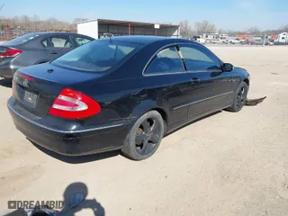 2005 Mercedes-Benz CLK-Class 3.2L with VIN WDBTJ65J05F150658, listed as a IAAI auction lot 41779179 with 201,461 mi miles. Bid and sale history available at carsss.com. Image 4.