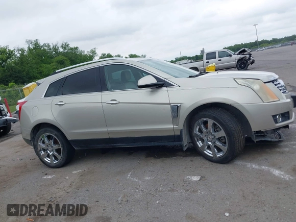 2014 Cadillac SRX Performance Collection z VIN 3GYFNCE35ES610504, wystawiony jako IAAI lot #42133548 z przebiegiem 140 306 mil mil oraz . Historia ofert i sprzedaży dostępna na DreamBid. Obrazek 13.