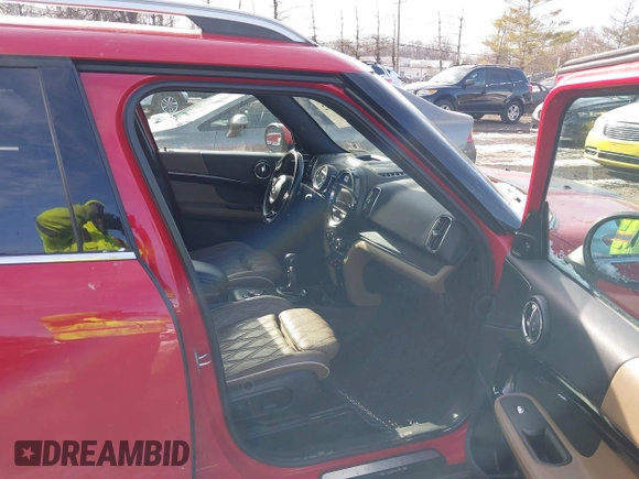 2019 MINI Countryman Cooper S with VIN WMZYT5C57K3E69637, listed as a IAAI auction lot 41379982 with 100,891 mi miles. Bid and sale history available at carsss.com. Image 5.