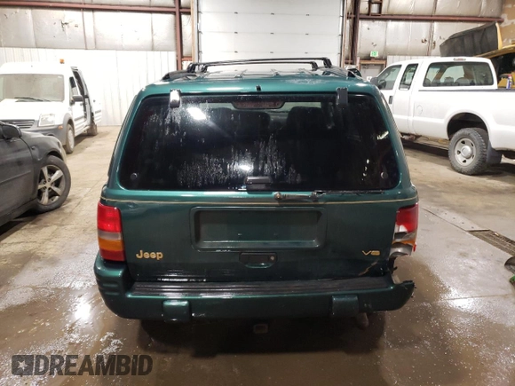 1997 Jeep Grand Cherokee Limited with VIN 1J4GZ78Y3VC733618, listed as a Copart auction lot 53757095 with 150,806 mi miles and Salvage title. Bid and sale history available at DreamBid. Image 6.