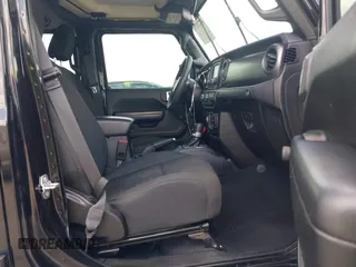 2019 Jeep Wrangler Unlimited Sport S with VIN 1C4HJXDG9KW653488, listed as a IAAI auction lot 42275297 with Not provided miles and . Bid and sale history available at DreamBid. Image 5.