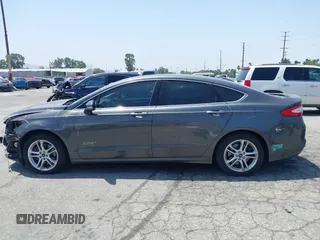 2016 Ford Fusion Titanium with VIN 3FA6P0SU1GR304590, listed as a IAAI auction lot 42381545 with 136,684 mi miles and . Bid and sale history available at DreamBid. Image 15.
