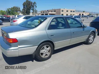 2001 Toyota Camry CE with VIN JT2BG22K810539653, listed as a IAAI auction lot 42236078 with 241,250 mi miles and . Bid and sale history available at DreamBid. Image 4.