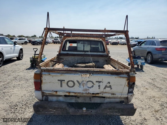 1987 Toyota Std Bed Trucks with VIN JT4RN50R4H0307297, listed as a Copart auction lot 69535844 with NaN miles and Clean Title. Bid and sale history available at carsss.com. Image 6.