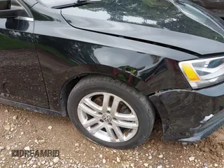 2017 Volkswagen Jetta S z VIN 3VW2B7AJ3HM303198, wystawiony jako IAAI lot #42651056 z przebiegiem 126 253 mil mil oraz . Historia ofert i sprzedaży dostępna na DreamBid. Obrazek 21.