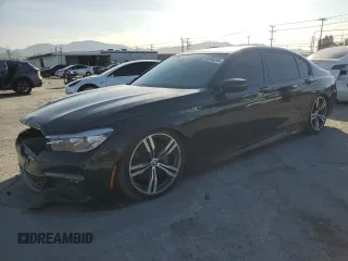 2019 BMW 7 Series 740i with VIN WBA7E2C51KB216852, listed as a Copart auction lot 50365695 with Not provided miles and Salvage title. Bid and sale history available at DreamBid. Image 1.