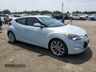 2015 Hyundai Veloster z VIN KMHTC6AD2FU221623, wystawiony jako Copart lot #58222615 z przebiegiem 176 801 mil mil oraz Czysty tytuł • Clean title. Historia ofert i sprzedaży dostępna na DreamBid. Obrazek 4.