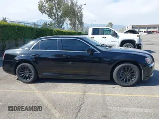 2014 Chrysler 300 with VIN 2C3CCAAG9EH264914, listed as a IAAI auction lot 42003052 with 103,789 mi miles. Bid and sale history available at carsss.com. Image 13.