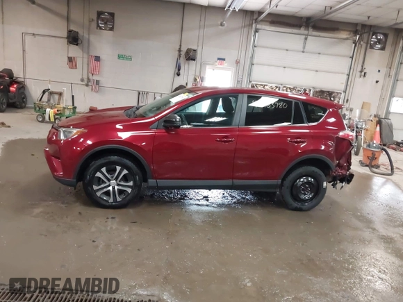 2018 Toyota RAV4 LE with VIN 2T3BFREV9JW825953, listed as a IAAI auction lot 42463780 with 74,128 mi miles and . Bid and sale history available at DreamBid. Image 14.