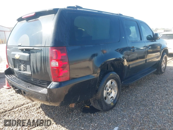 2014 Chevrolet Suburban LT with VIN 1GNSCJE00ER198703, listed as a IAAI auction lot 41952805 with 228,579 mi miles and . Bid and sale history available at DreamBid. Image 4.
