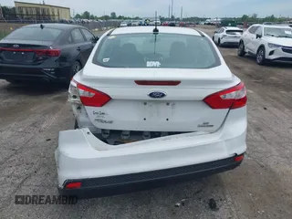 2013 Ford Focus SE with VIN 1FADP3F24DL380185, listed as a IAAI auction lot 42312998 with Not provided miles and . Bid and sale history available at DreamBid. Image 16.