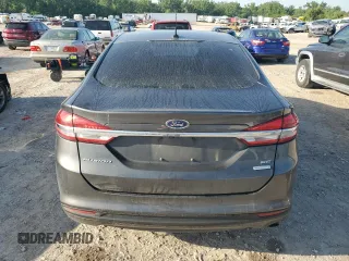 2017 Ford Fusion SE z VIN 3FA6P0HD6HR156834, wystawiony jako Copart lot #55144955 z przebiegiem 114 497 mil mil oraz Szkoda całkowita • Salvage title. Historia ofert i sprzedaży dostępna na DreamBid. Obrazek 6.
