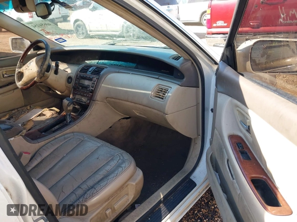 2004 Toyota Avalon XL with VIN 4T1BF28B14U370490, listed as a IAAI auction lot 40684154 with 251,101 mi miles and . Bid and sale history available at DreamBid. Image 5.