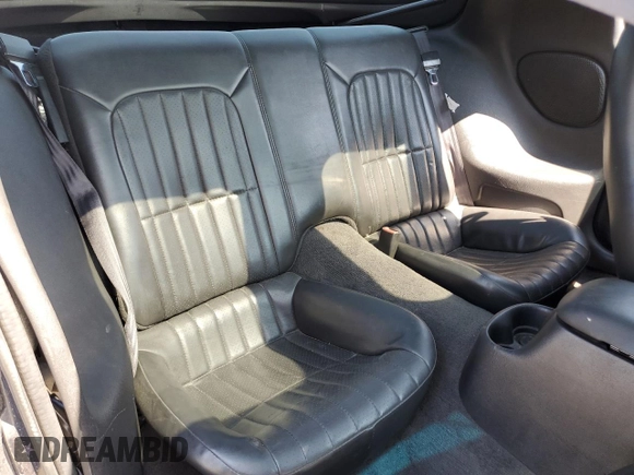 2000 Chevrolet Camaro Z28 z VIN 2G1FP22G9Y2162742, wystawiony jako Copart lot #62568574 z przebiegiem 87 834 mil mil oraz Szkoda całkowita • Salvage title. Historia ofert i sprzedaży dostępna na DreamBid. Obrazek 11.