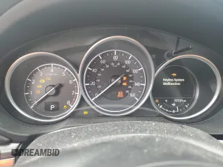 2018 Mazda CX-5 Grand Touring с VIN JM3KFBDM8J0424633, выставлен на аукционе Copart как лот 59888035 с пробегом 77 721 миль миль и Списание • Salvage title. История ставок и продаж доступна на DreamBid. Изображение 9.