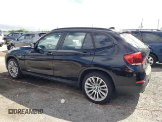2014 BMW X1 xDrive28i z VIN WBAVL1C5XEVY16263, wystawiony jako Copart lot #52242225 z przebiegiem 154 951 mil mil oraz Szkoda całkowita • Salvage title. Historia ofert i sprzedaży dostępna na DreamBid. Obrazek 2.