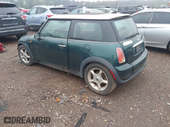 2006 MINI Hardtop with VIN WMWRC33506TK73564, listed as a IAAI auction lot 42602486 with 156,459 mi miles and . Bid and sale history available at DreamBid. Image 3.