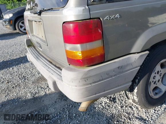 1997 Jeep Grand Cherokee Laredo with VIN 1J4GZ58S1VC603868, listed as a IAAI auction lot 42467813 with 297,306 mi miles and . Bid and sale history available at DreamBid. Image 6.