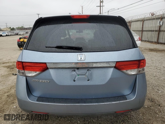 2014 Honda Odyssey EX-L with VIN 5FNRL5H68EB103941, listed as a Copart auction lot 60715095 with 109,013 mi miles and Salvage title. Bid and sale history available at DreamBid. Image 6.