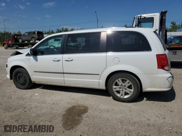 2017 Dodge Grand Caravan Crew Plus with VIN 2C4RDGDG6HR765484, listed as a Copart auction lot 63389874 with 169,529 mi miles and Salvage Title. Bid and sale history available at DreamBid. Image 2.