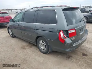 2007 Honda Odyssey EX-L with VIN 5FNRL386X7B423012, listed as a IAAI auction lot 41876854 with 266,588 mi miles. Bid and sale history available at carsss.com. Image 3.