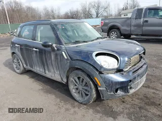 2013 MINI Countryman S ALL4 with VIN WMWZC5C58DWP30936, listed as a IAAI auction lot 41314553 with 128,405 mi miles and . Bid and sale history available at DreamBid. Image 1.