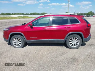 2014 Jeep Cherokee Limited with VIN 1C4PJMDB7EW165272, listed as a IAAI auction lot 35106260 with 102,934 mi miles and . Bid and sale history available at DreamBid. Image 14.