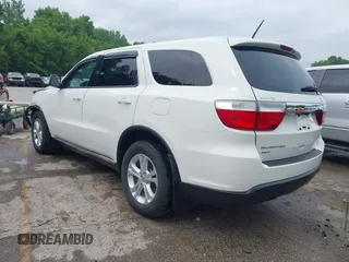 2012 Dodge Durango SXT with VIN 1C4RDJAG8CC336267, listed as a IAAI auction lot 42377138 with 179,555 mi miles and . Bid and sale history available at DreamBid. Image 3.