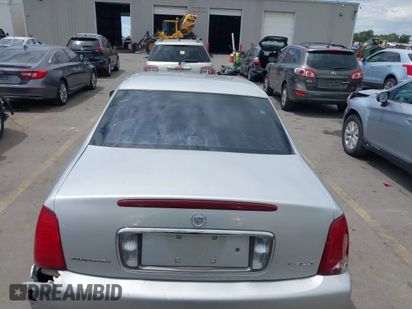 2002 Cadillac DeVille z VIN 1G6KD54Y22U108080, wystawiony jako IAAI lot #42304179 z przebiegiem 278 141 mil mil oraz . Historia ofert i sprzedaży dostępna na DreamBid. Obrazek 16.