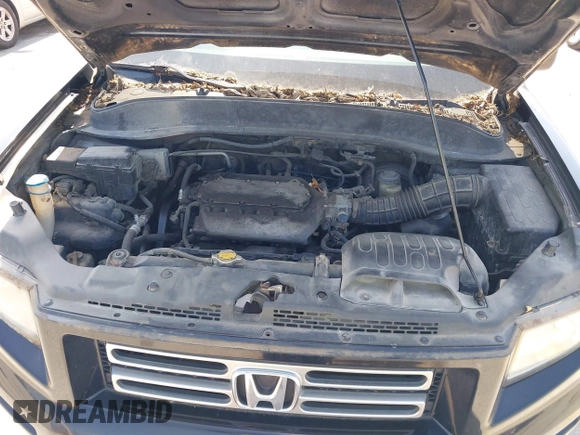 2008 Honda Ridgeline RTL with VIN 2HJYK16588H519676, listed as a IAAI auction lot 42561015 with 122,344 mi miles and . Bid and sale history available at DreamBid. Image 10.