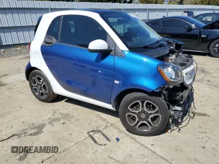 2016 Smart fortwo Passion z VIN WMEFJ5DA6GK064695, wystawiony jako Copart lot #53528315 z przebiegiem 53 508 mil mil oraz Szkody całkowita. Historia ofert i sprzedaży dostępna na DreamBid. Obrazek 4.