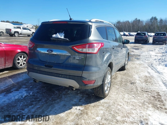 2015 Ford Escape Titanium with VIN 1FMCU9JX6FUB86304, listed as a IAAI auction lot 41595761 with 104,317 mi miles and . Bid and sale history available at DreamBid. Image 4.