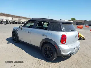 2014 MINI Countryman S with VIN WMWZC5C54EWP40882, listed as a IAAI auction lot 42633141 with 176,641 mi miles and . Bid and sale history available at DreamBid. Image 3.