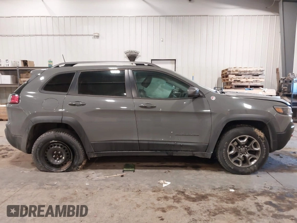 2019 Jeep Cherokee Trailhawk Elite with VIN 1C4PJMBX7KD361203, listed as a IAAI auction lot 41515943 with 133,384 mi miles. Bid and sale history available at carsss.com. Image 13.