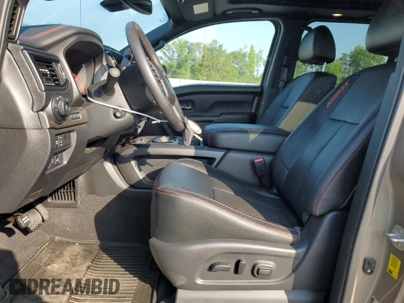 2021 Nissan Titan Pro-4X with VIN 1N6AA1ED0MN507652, listed as a Copart auction lot 62156505 with 13,085 mi miles and Salvage title. Bid and sale history available at DreamBid. Image 7.