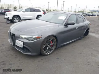 2019 Alfa Romeo Giulia Ti with VIN ZARFAMBN6K7607298, listed as a IAAI auction lot 42020714 with 67,469 mi miles. Bid and sale history available at carsss.com. Image 2.