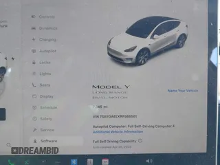 2024 Tesla Model Y Long Range with VIN 7SAYGAEEXRF988561, listed as a IAAI auction lot 42058248 with 7,845 mi miles. Bid and sale history available at carsss.com. Image 7.