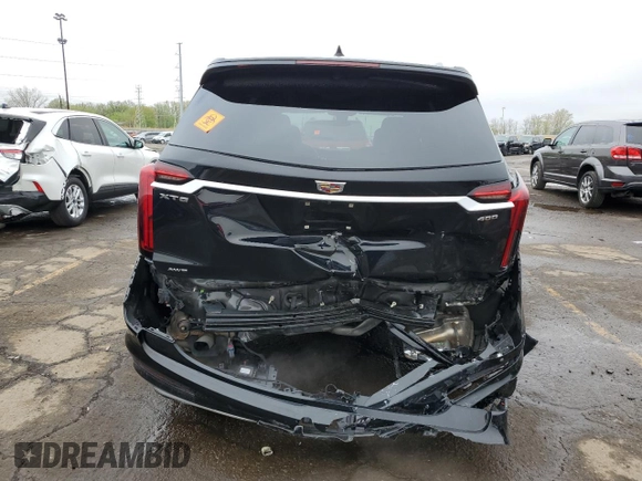 2022 Cadillac XT6 Premium Luxury z VIN 1GYKPDRSXNZ161744, wystawiony jako Copart lot #54901995 z przebiegiem 24 994 mil mil oraz Szkoda całkowita • Salvage title. Historia ofert i sprzedaży dostępna na DreamBid. Obrazek 6.