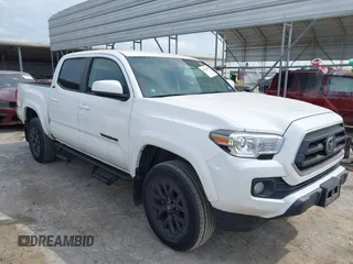 2021 Toyota Tacoma SR5 with VIN 5TFAZ5CN0MX118416, listed as a IAAI auction lot 42155687 with 62,329 mi miles and . Bid and sale history available at DreamBid. Image 1.