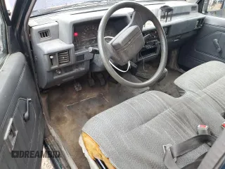 1993 Mitsubishi Mighty Max z VIN JA7LS21G6PP003529, wystawiony jako Copart lot #81342224 z przebiegiem 313 363 mil mil oraz Szkody całkowita. Historia ofert i sprzedaży dostępna na DreamBid. Obrazek 8.