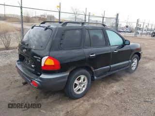 2004 Hyundai Santa Fe GLS z VIN KM8SC73E04U607574, wystawiony jako IAAI lot #41879786 z przebiegiem 183 474 mil mil oraz . Historia ofert i sprzedaży dostępna na DreamBid. Obrazek 4.