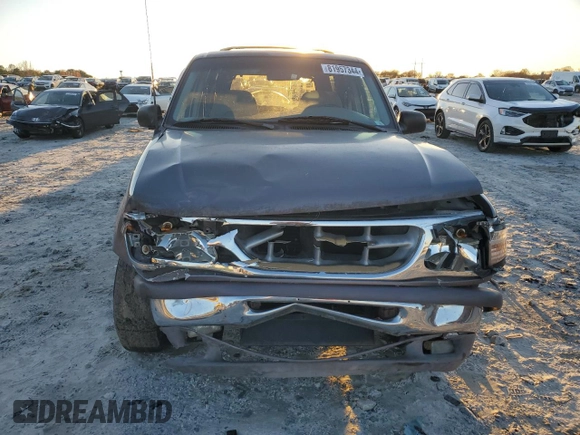 1997 Ford Explorer XL with VIN 1FMDU34XXVUC61582, listed as a Copart auction lot 81957344 with 153,852 mi miles and Salvage title. Bid and sale history available at DreamBid. Image 5.
