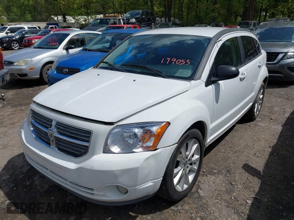 2011 Dodge Caliber Heat with VIN 1B3CB5HA9BD179055, listed as a IAAI auction lot 42008150 with 245,700 mi miles and . Bid and sale history available at DreamBid. Image 2.